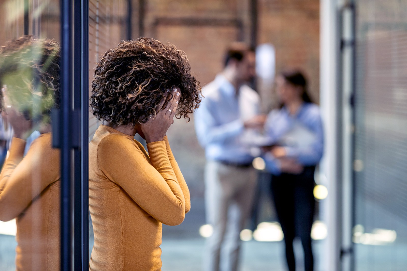 Woman in distress in the workplace.