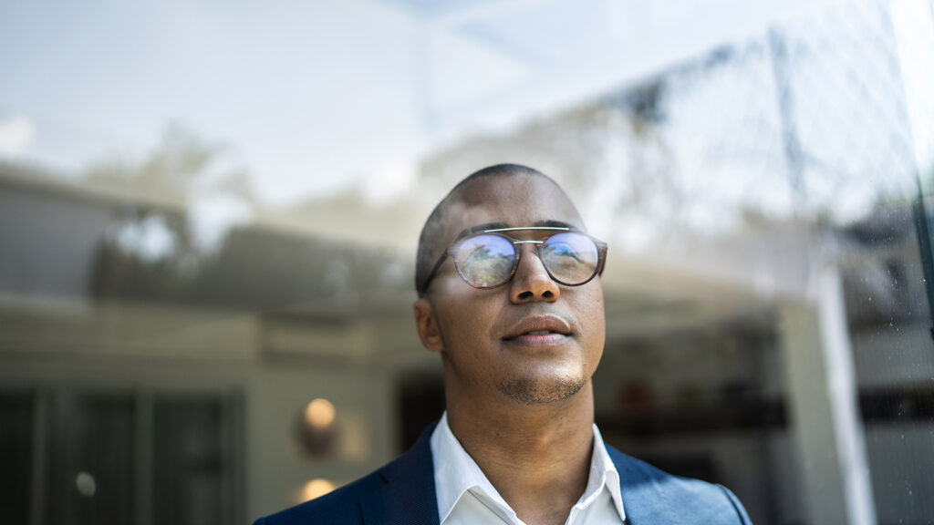 Businessman looking out of window