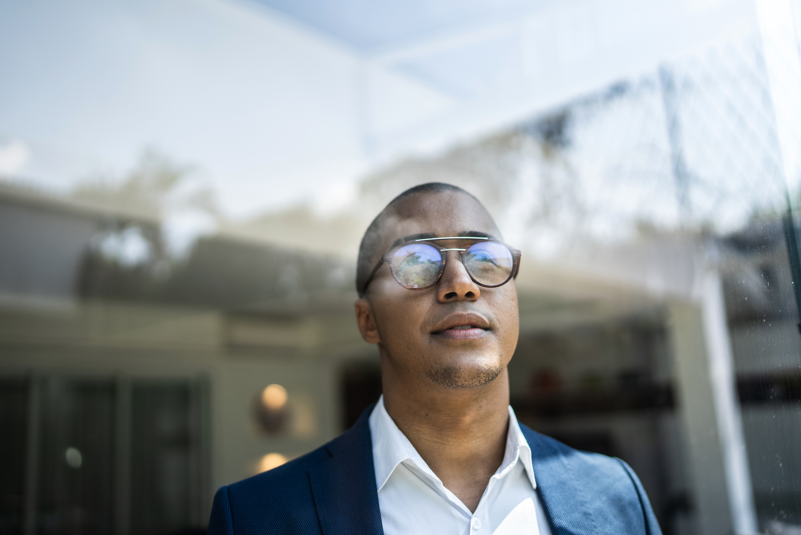 Businessman looking out of window