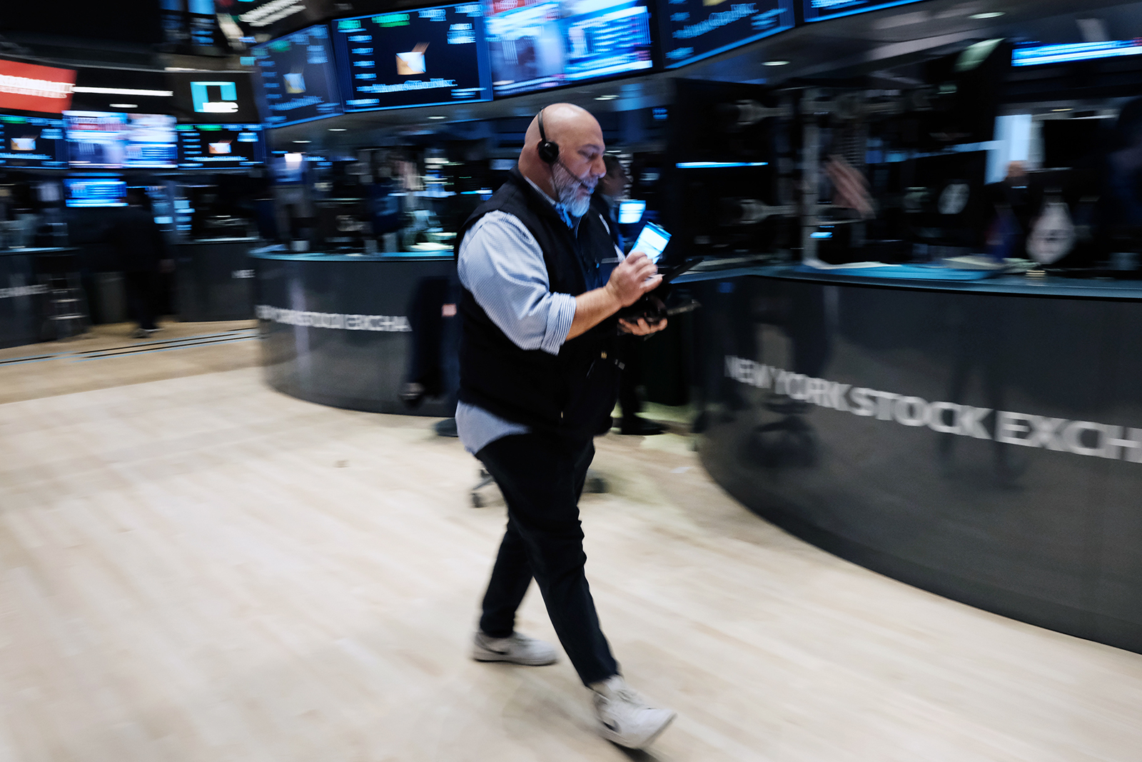 Traders work on the floor of the New York Stock Exchange